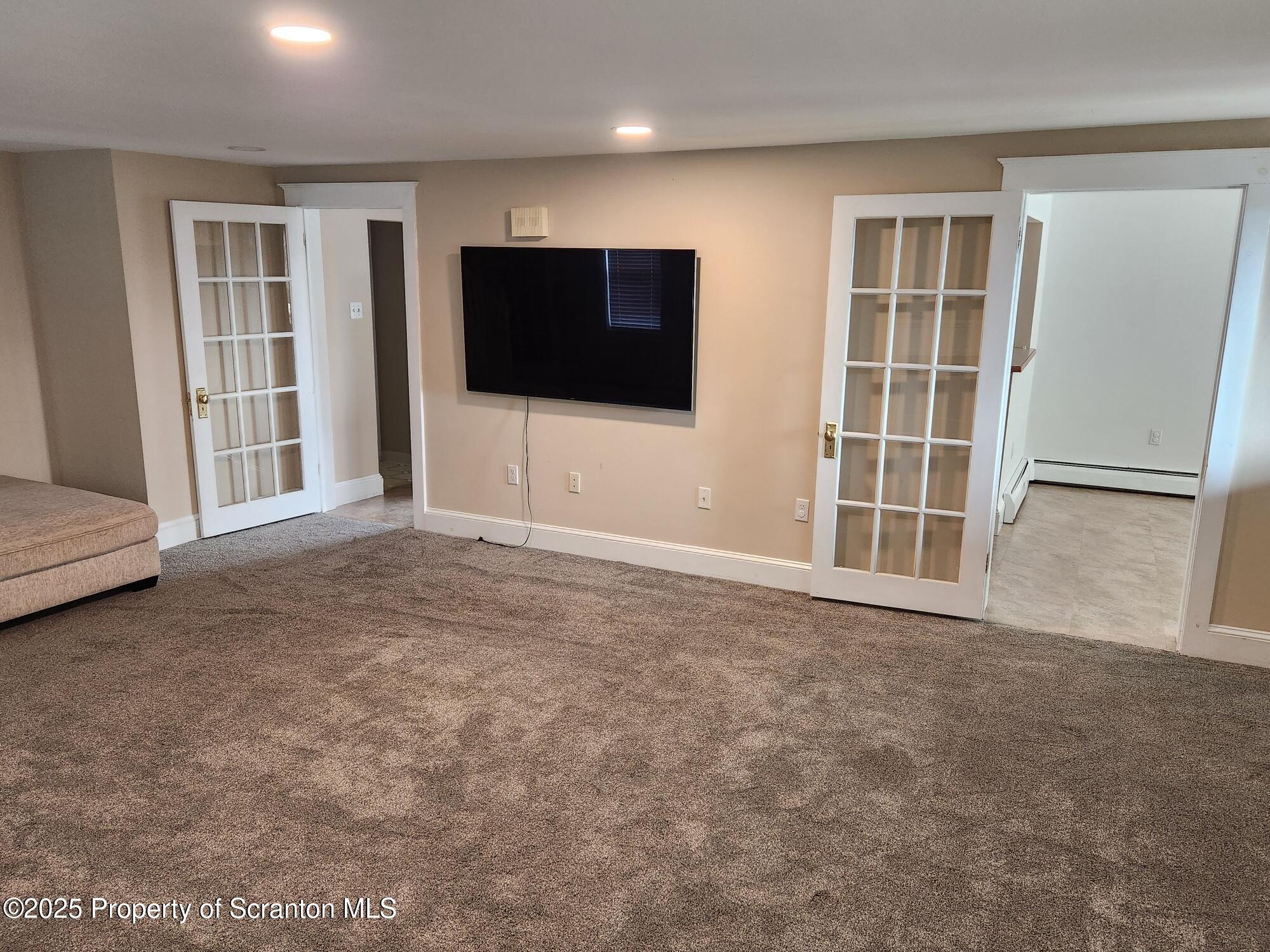 16 Flanagan Street Pringle, PA 18704 - Photo 7 of 33 an empty room with windows