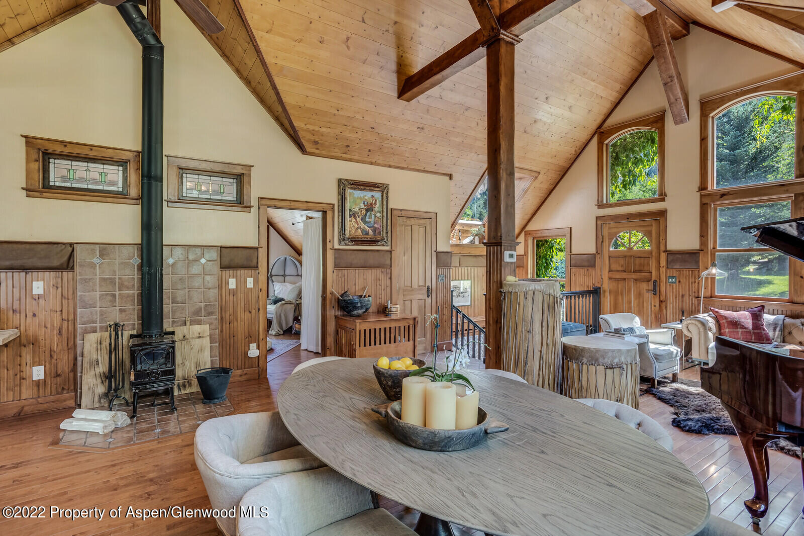 800 Dorais Way Redstone, CO 81623 - Photo 16 of 35 a dining room with furniture a rug and wooden floor