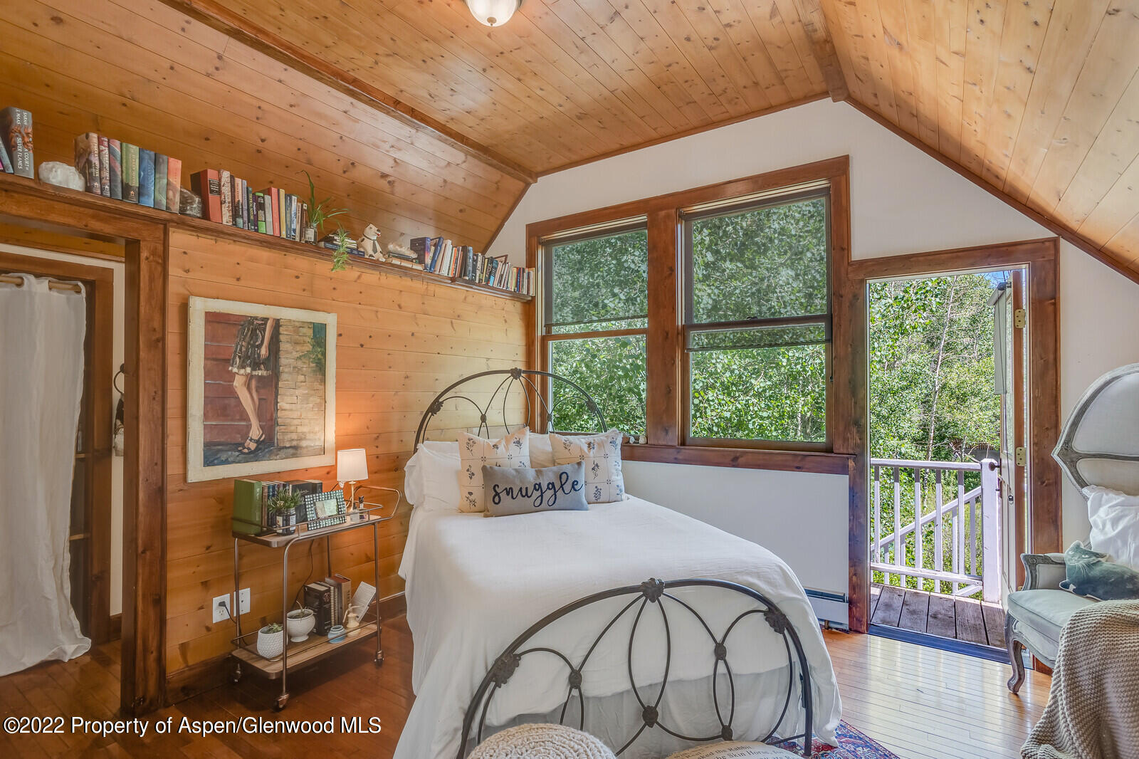 800 Dorais Way Redstone, CO 81623 - Photo 17 of 35 a bedroom with a bed and with a large window