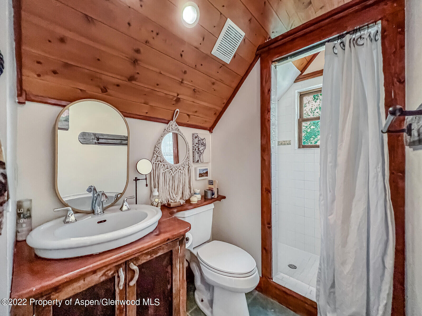 800 Dorais Way Redstone, CO 81623 - Photo 19 of 35 a bathroom with a sink toilet and mirror