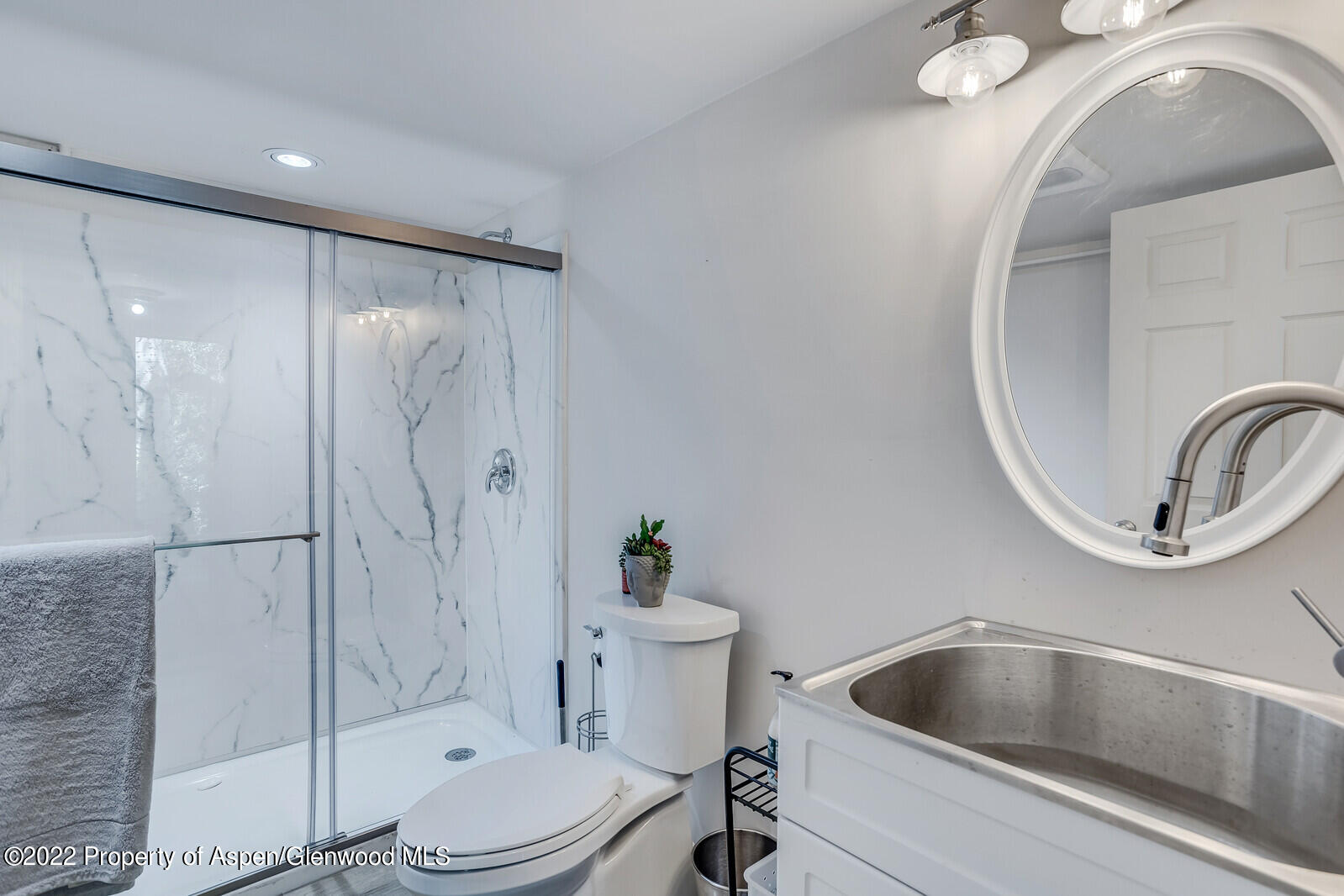 800 Dorais Way Redstone, CO 81623 - Photo 27 of 35 a bathroom with a sink and a mirror