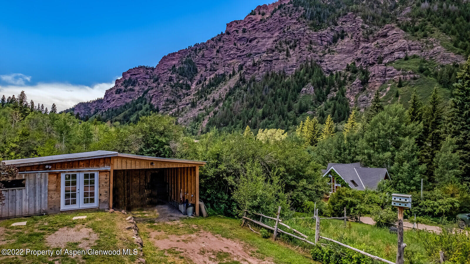 800 Dorais Way Redstone, CO 81623 - Photo 33 of 35 a front view of a house with a yard