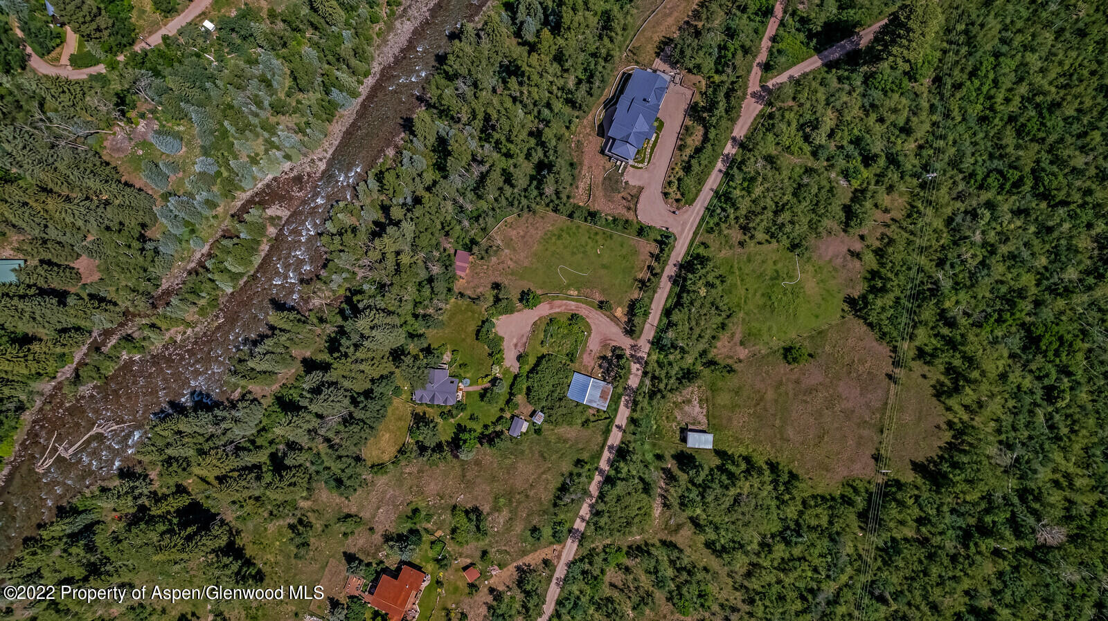 800 Dorais Way Redstone, CO 81623 - Photo 35 of 35 an aerial view of a house with a yard