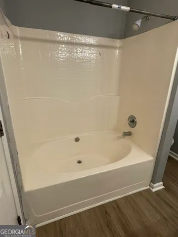 a bathroom with a bathtub