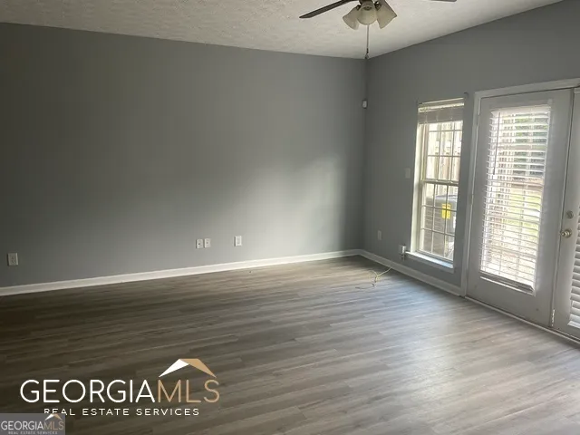 a view of an empty room with window