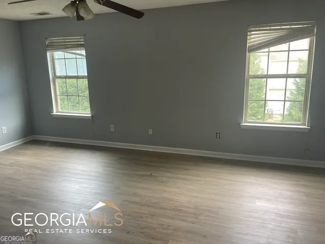 an empty room with window