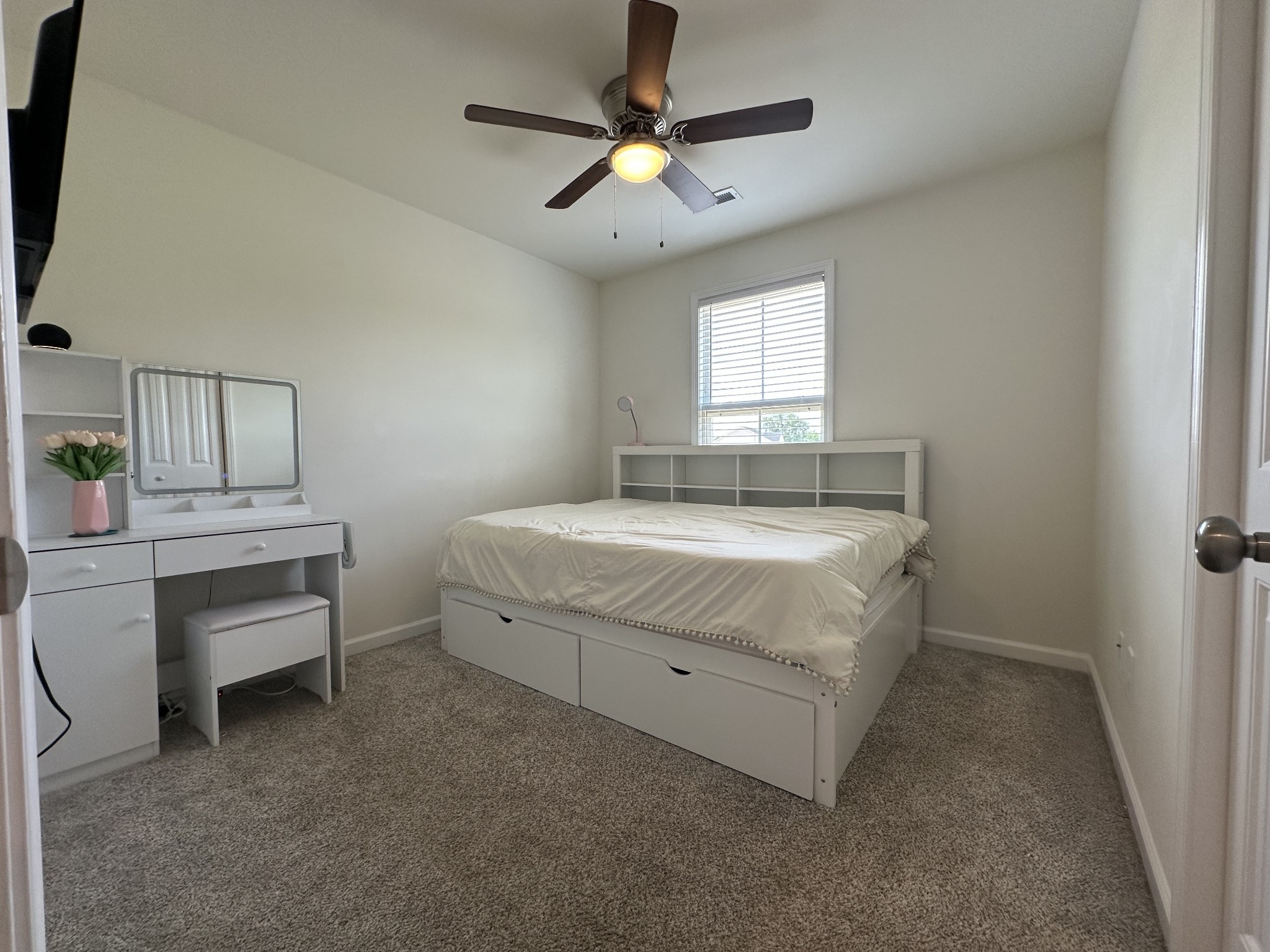 128 Quarry Rdg Road Clarksville, TN 37043 - Photo 20 of 24 a spacious bedroom with a bed and a table in it