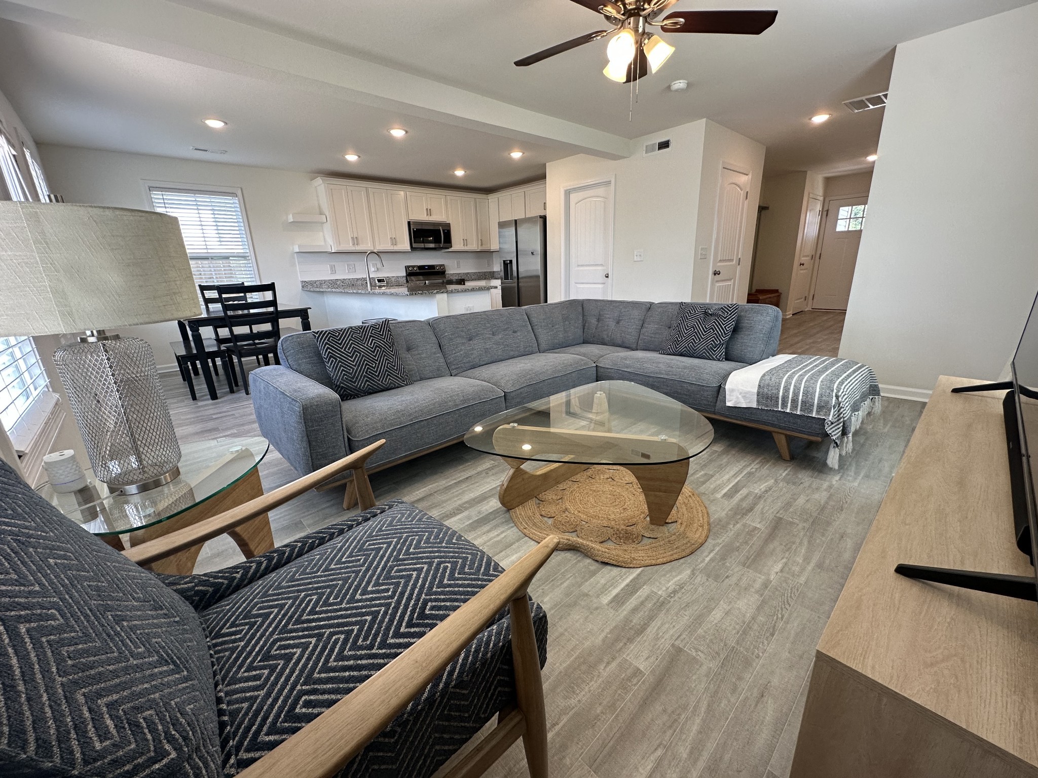 128 Quarry Rdg Road Clarksville, TN 37043 - Photo 9 of 24 a living room with furniture and a wooden floor