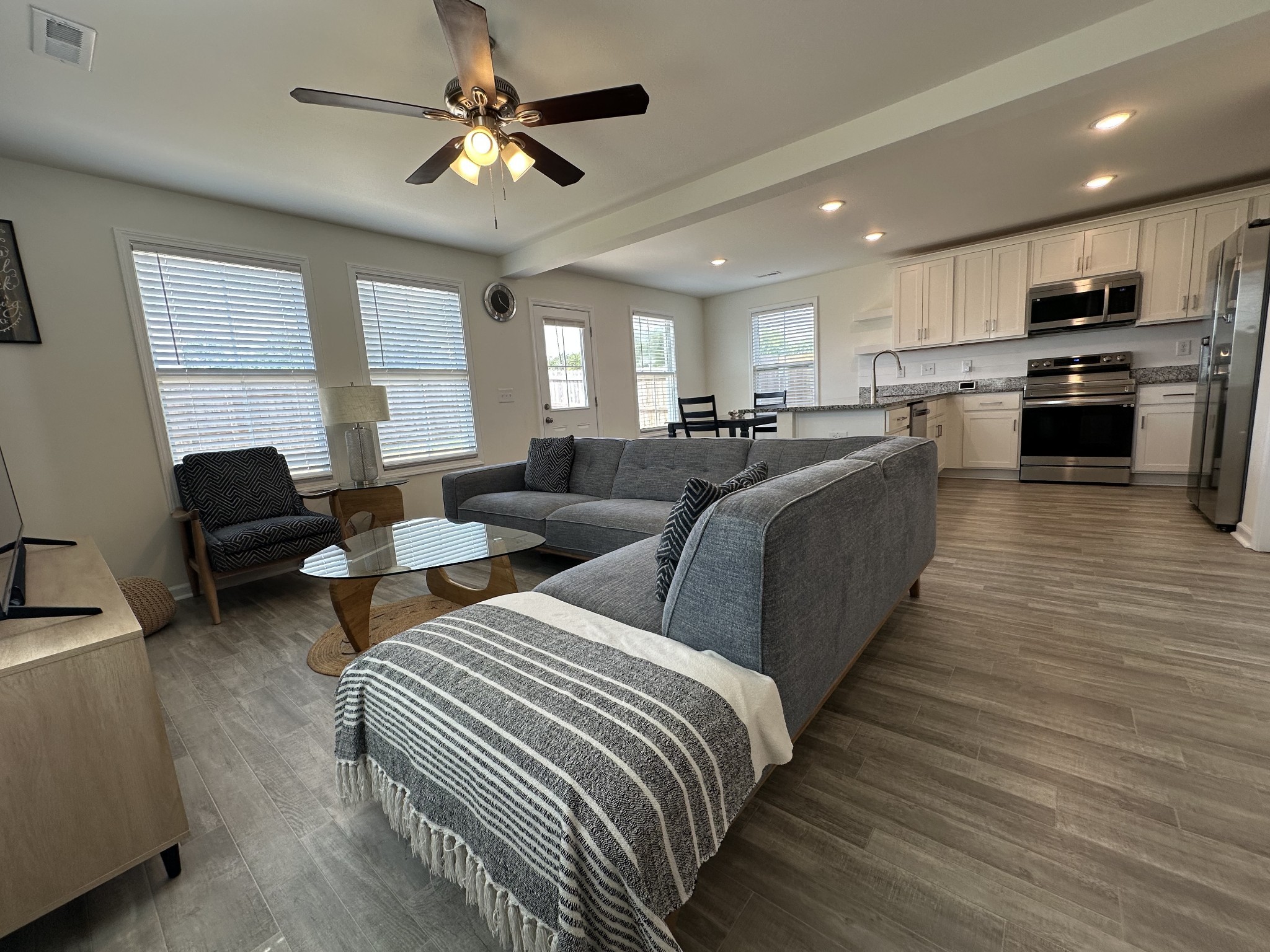 128 Quarry Rdg Road Clarksville, TN 37043 - Photo 10 of 24 a living room with furniture and a large window