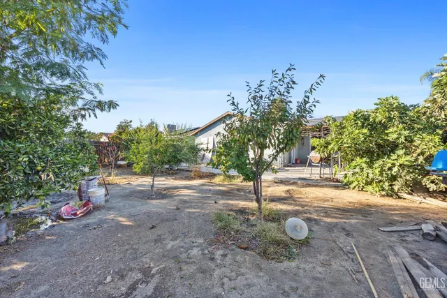 a view of a backyard of a house
