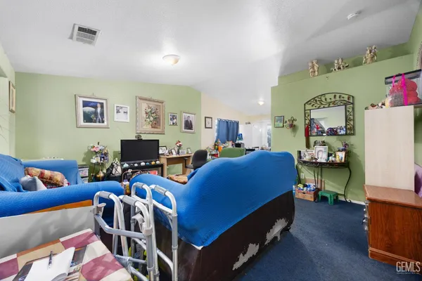 a bed room with furniture and a couch