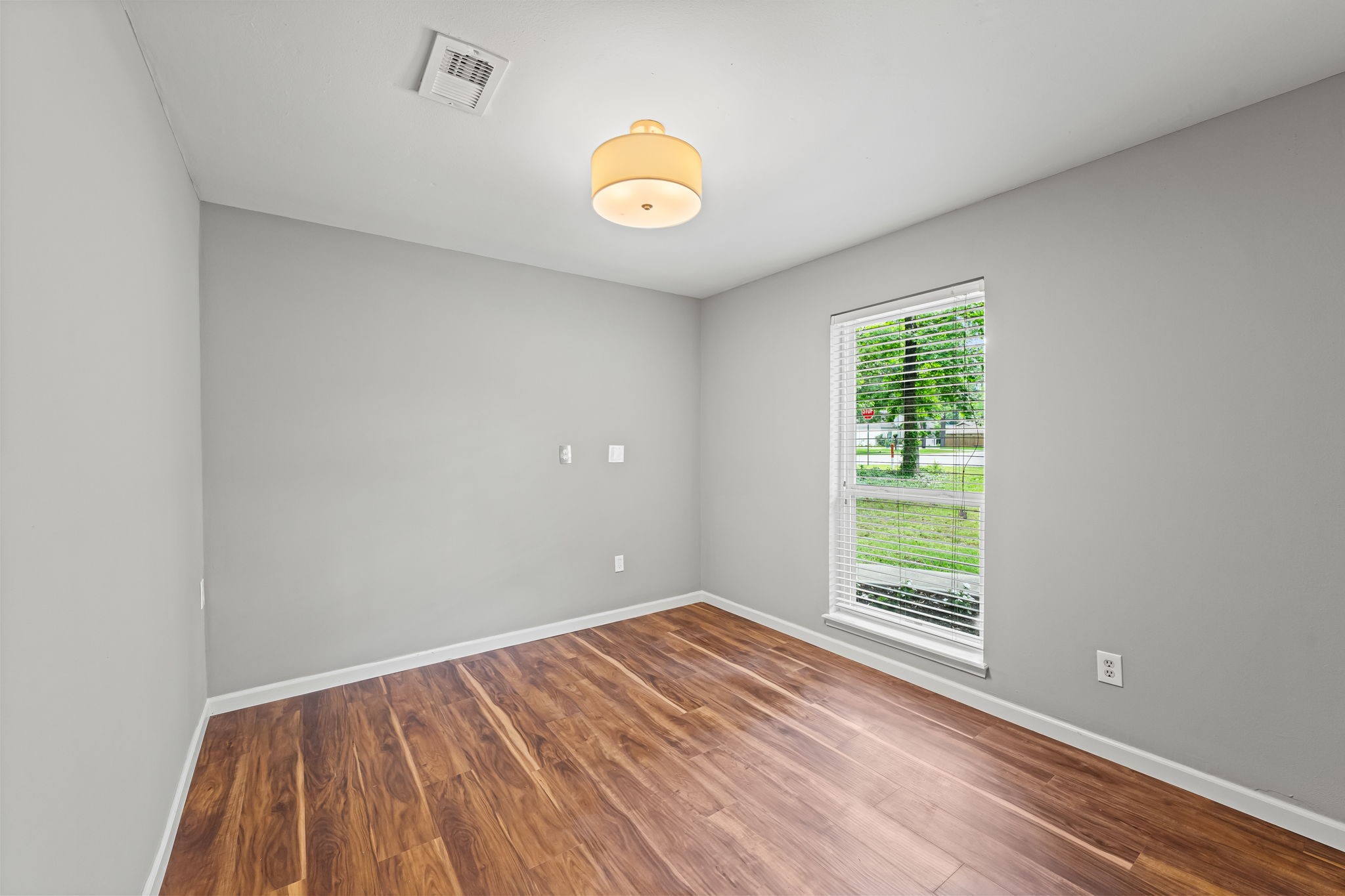 25802 Maplewood Drive Spring, TX 77386 - Photo 11 of 32 a view of an empty room and window