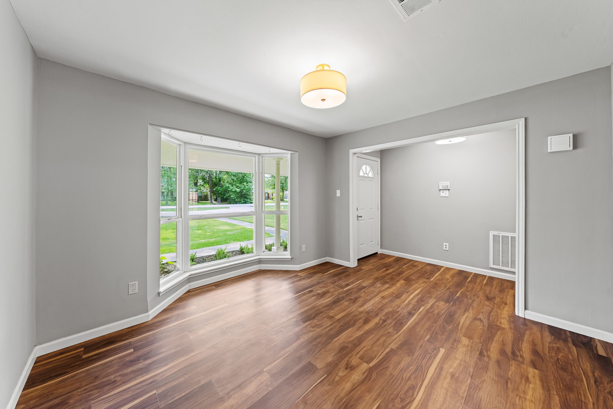 25802 Maplewood Drive Spring, TX 77386 - Photo 12 of 32 a view of an empty room with a window