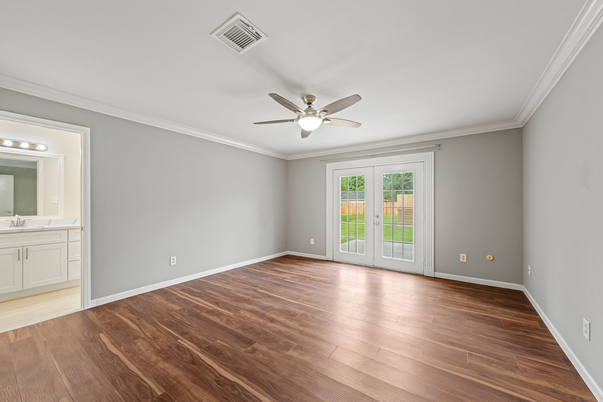 25802 Maplewood Drive Spring, TX 77386 - Photo 22 of 32 wooden floor in an empty room with a window