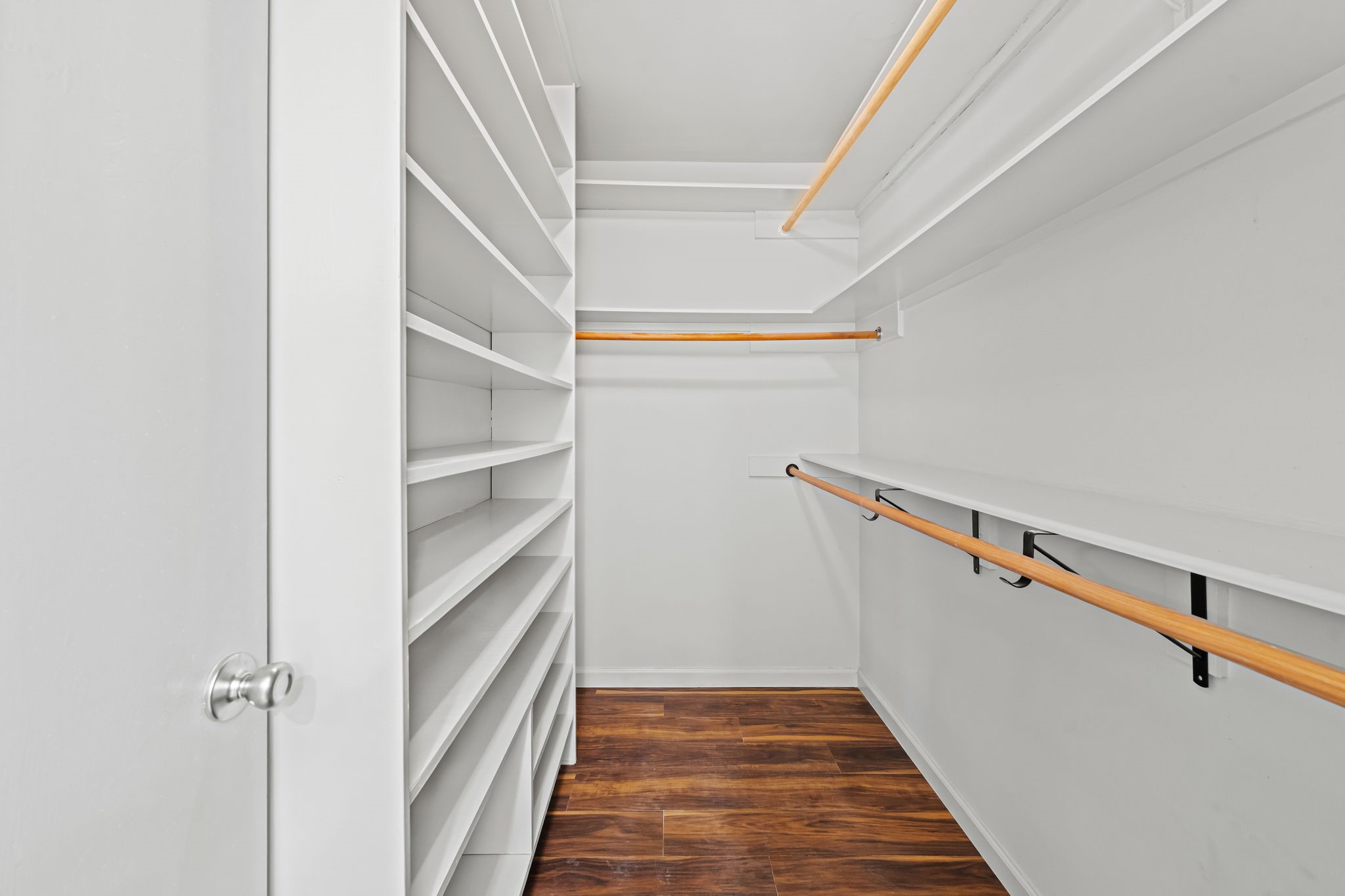 25802 Maplewood Drive Spring, TX 77386 - Photo 23 of 32 a view of a hallway with wooden floor and staircase