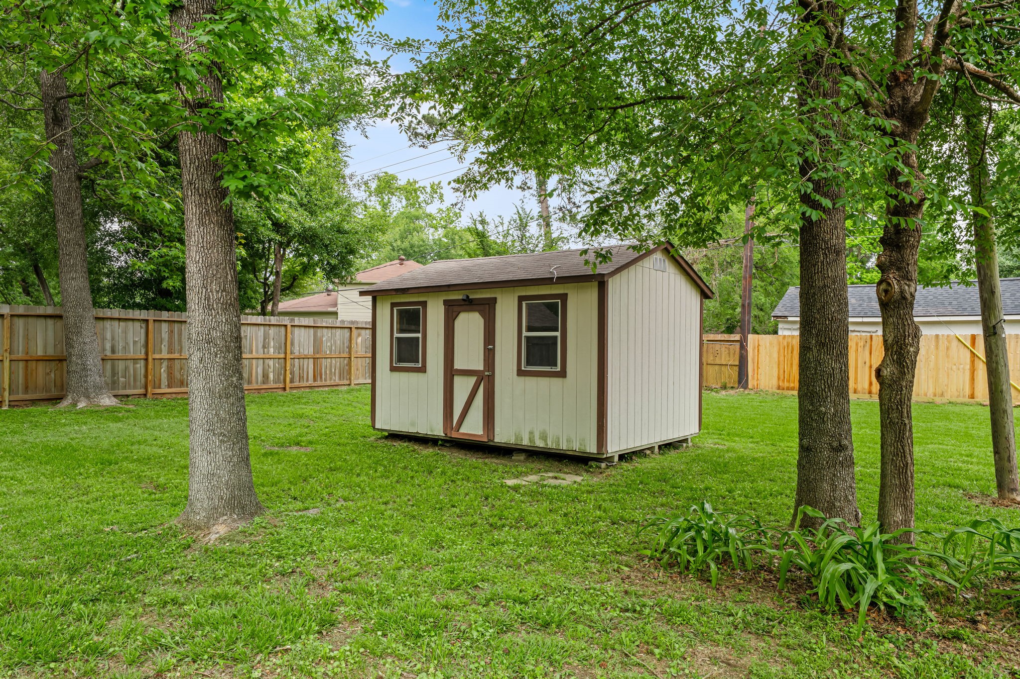 25802 Maplewood Drive Spring, TX 77386 - Photo 26 of 32 a view of a house with backyard