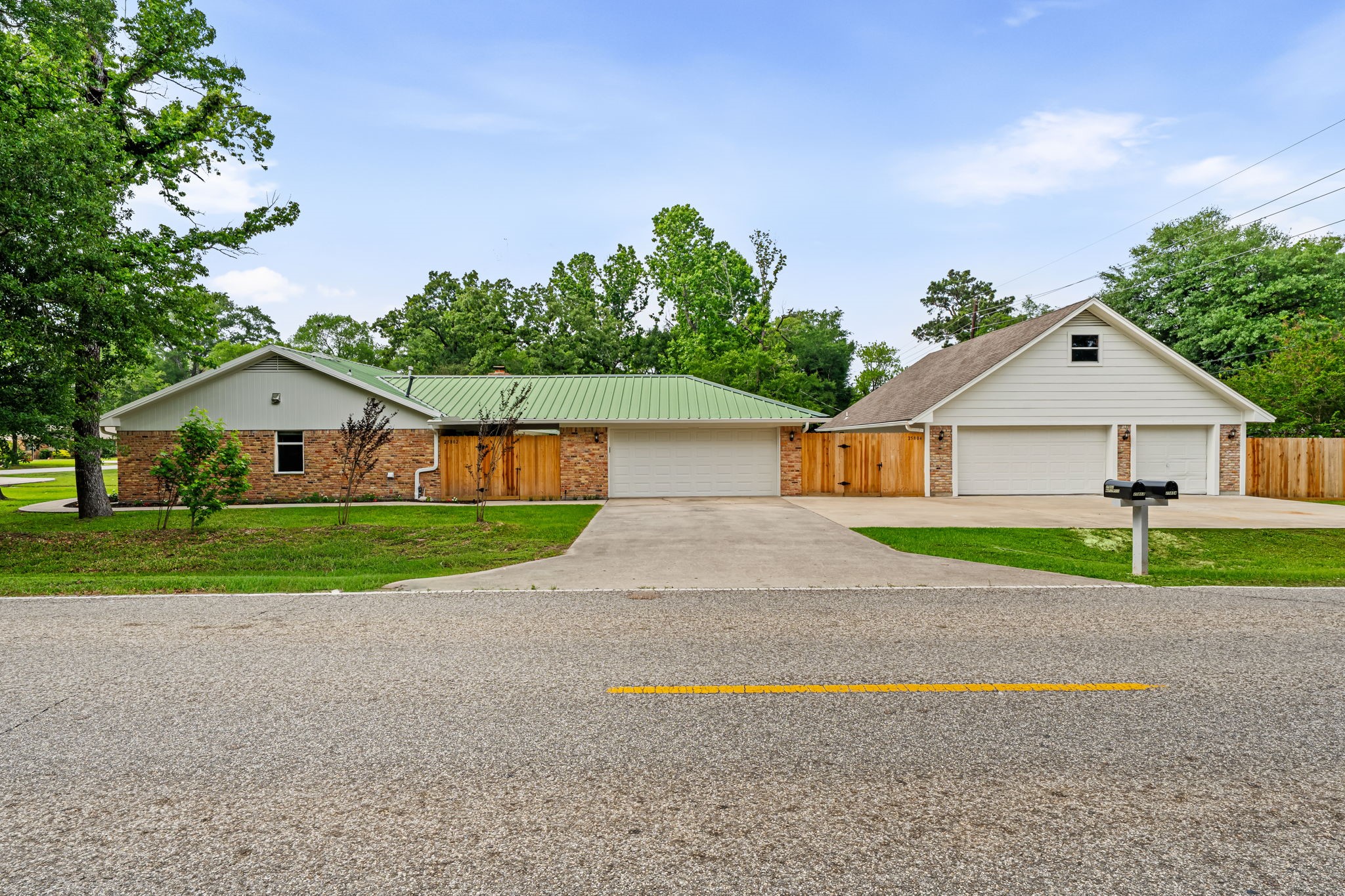 25802 Maplewood Drive Spring, TX 77386 - Photo 28 of 32 a view of house with outdoor space and street view