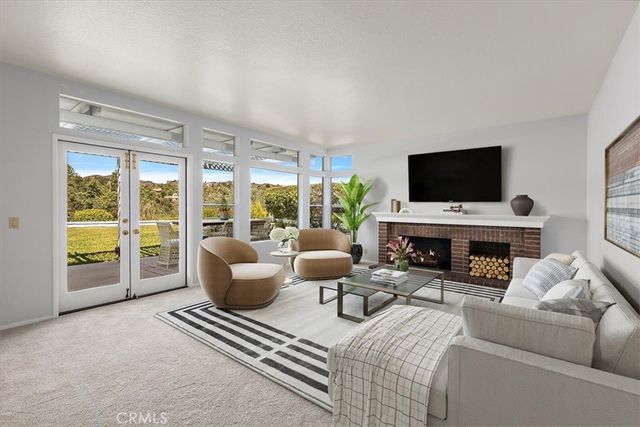 a view of kitchen with furniture and window