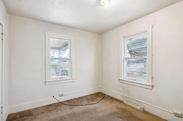 a view of front door with a bedroom