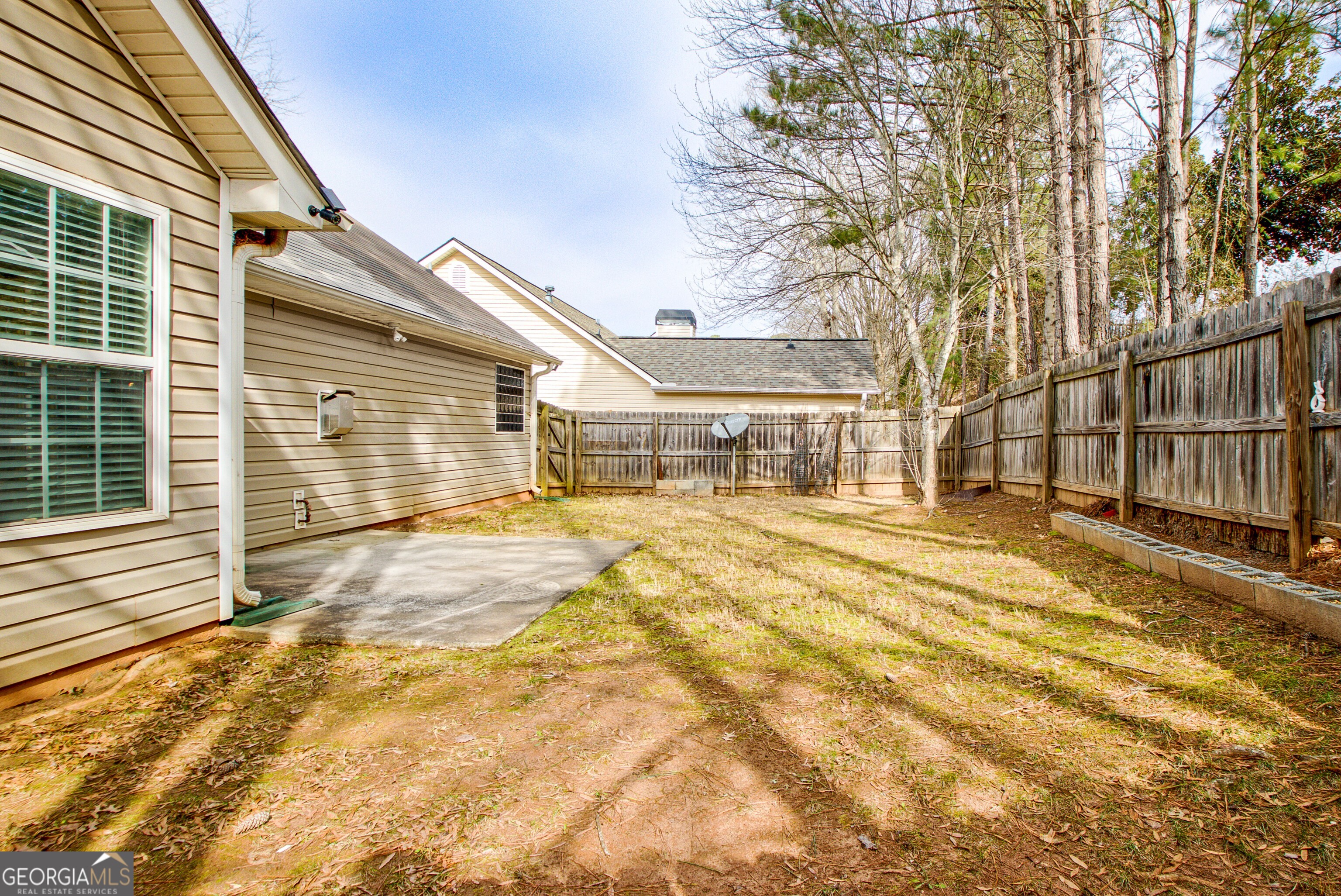 503 Hunterian Place Newnan, GA 30265 - Photo 26 of 28 a bathroom with a sink and mirror