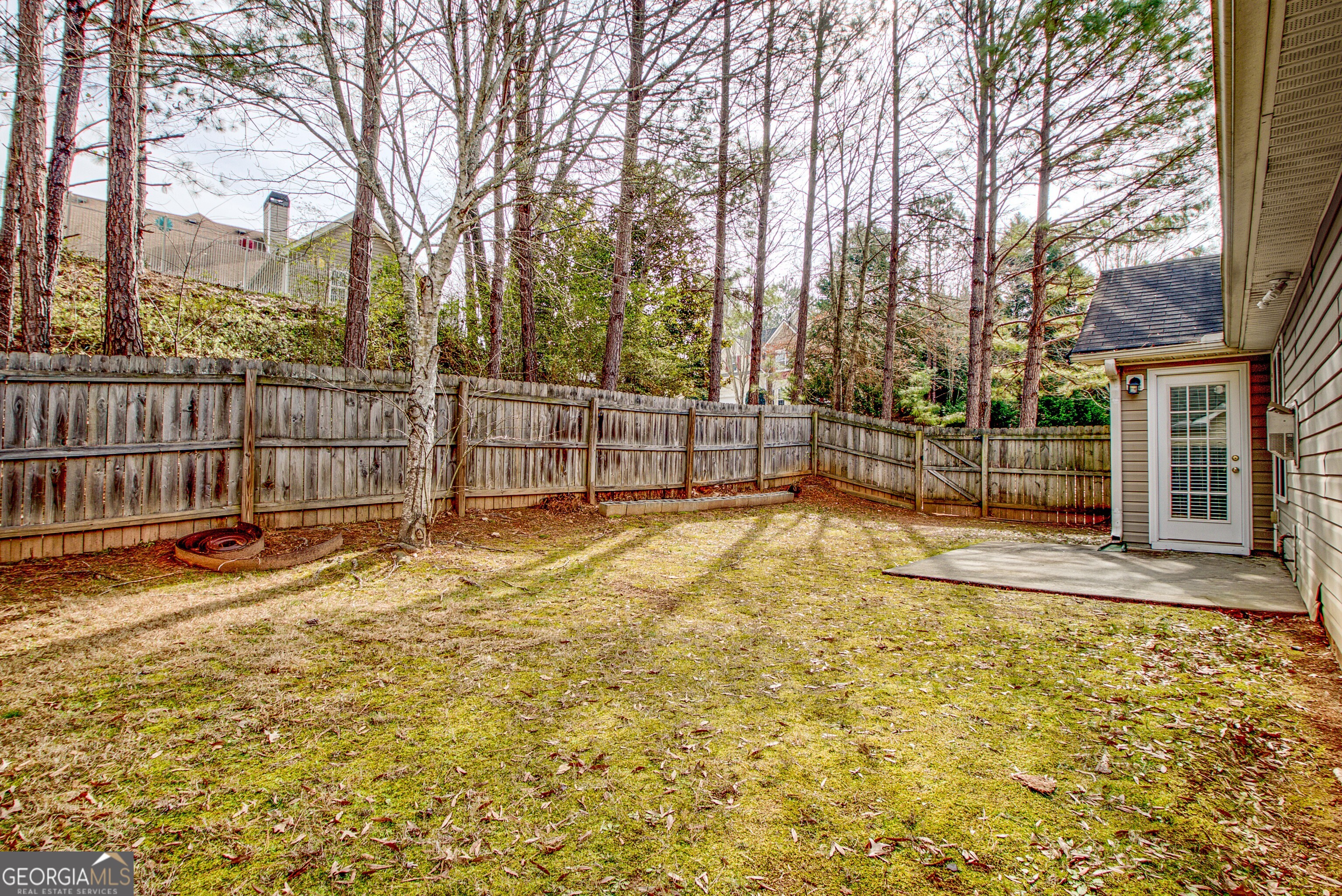 503 Hunterian Place Newnan, GA 30265 - Photo 27 of 28 a view of a yard with basketball court