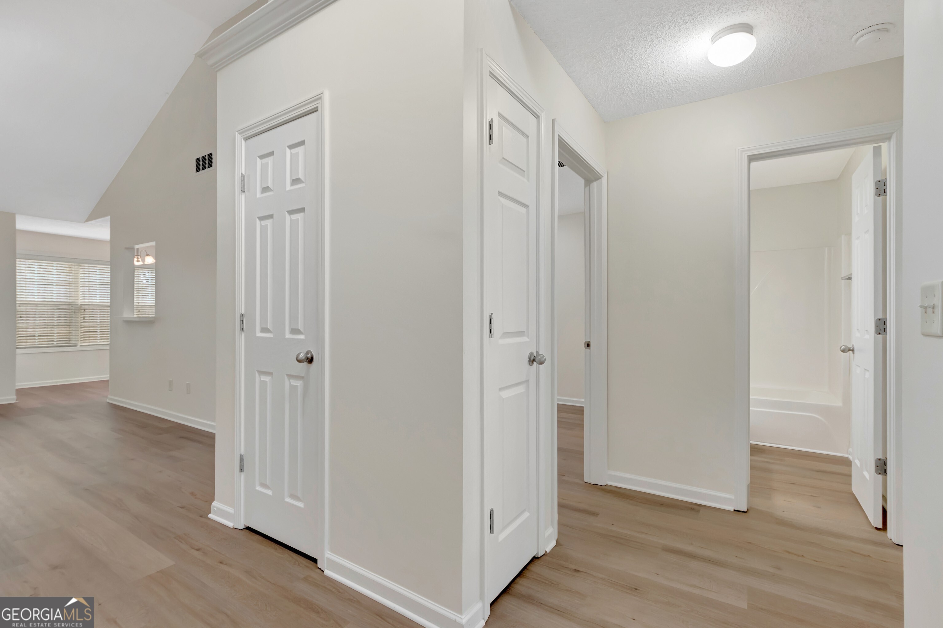 503 Hunterian Place Newnan, GA 30265 - Photo 7 of 28 a view of entryway with wooden floor