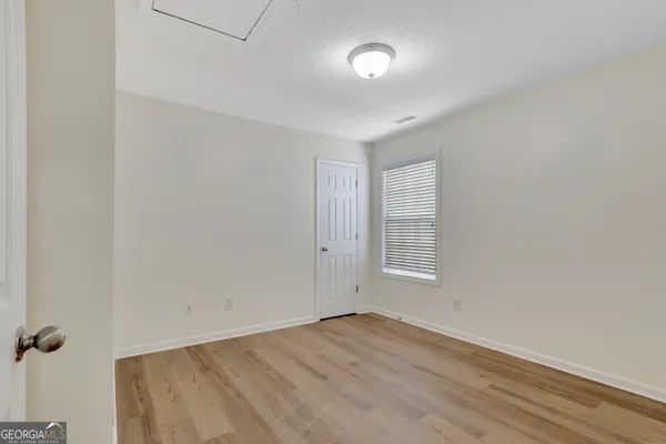 an empty room with a window