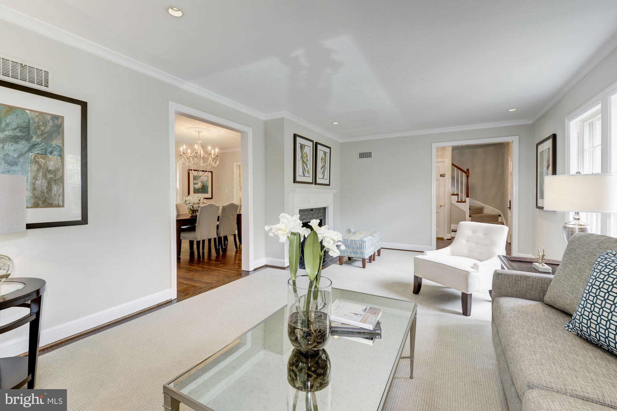 4711 Reservoir Road Northwest Washington, DC 20007 - Photo 7 of 30 Living room with wood burning fireplace