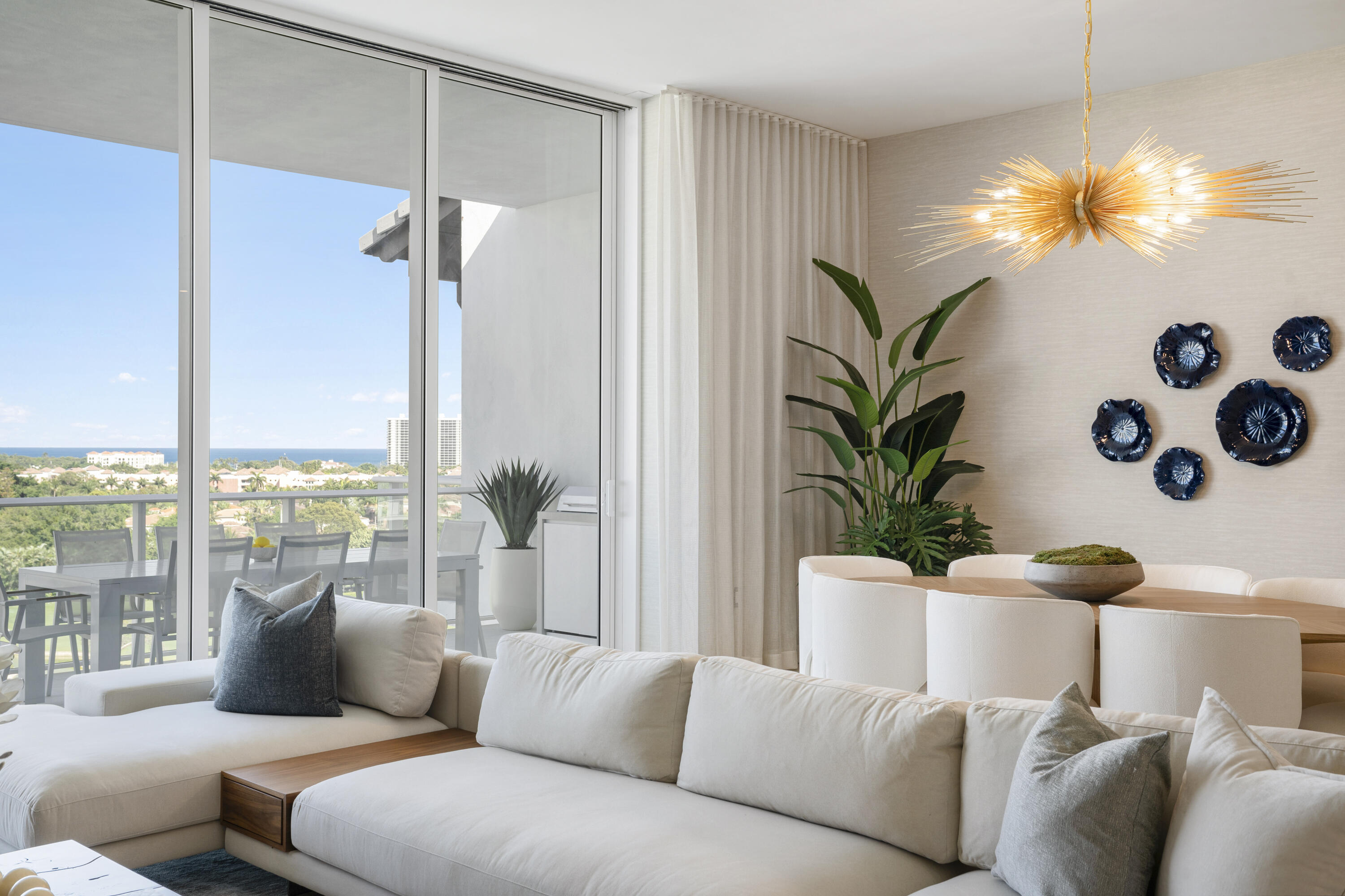 220 Southeast Mizner Boulevard, Unit PH921 Boca Raton, FL 33432 - Photo 17 of 21 a living room with furniture and a large window