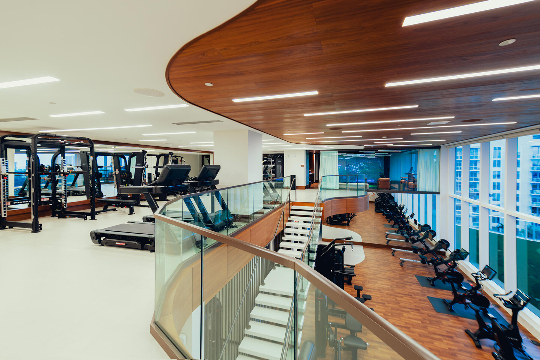 220 Southeast Mizner Boulevard, Unit PH921 Boca Raton, FL 33432 - Photo 18 of 21 a view of a room with gym equipment