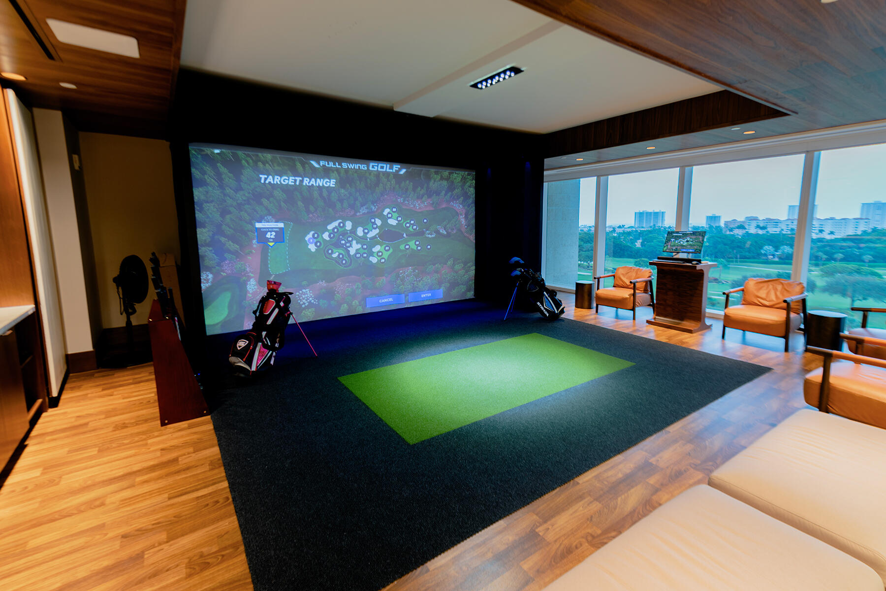 220 Southeast Mizner Boulevard, Unit PH921 Boca Raton, FL 33432 - Photo 20 of 21 a living room with pool table and a flat screen tv