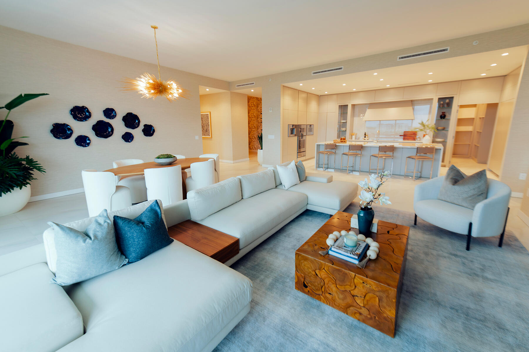 220 Southeast Mizner Boulevard, Unit PH921 Boca Raton, FL 33432 - Photo 4 of 21 a living room with furniture and a large window