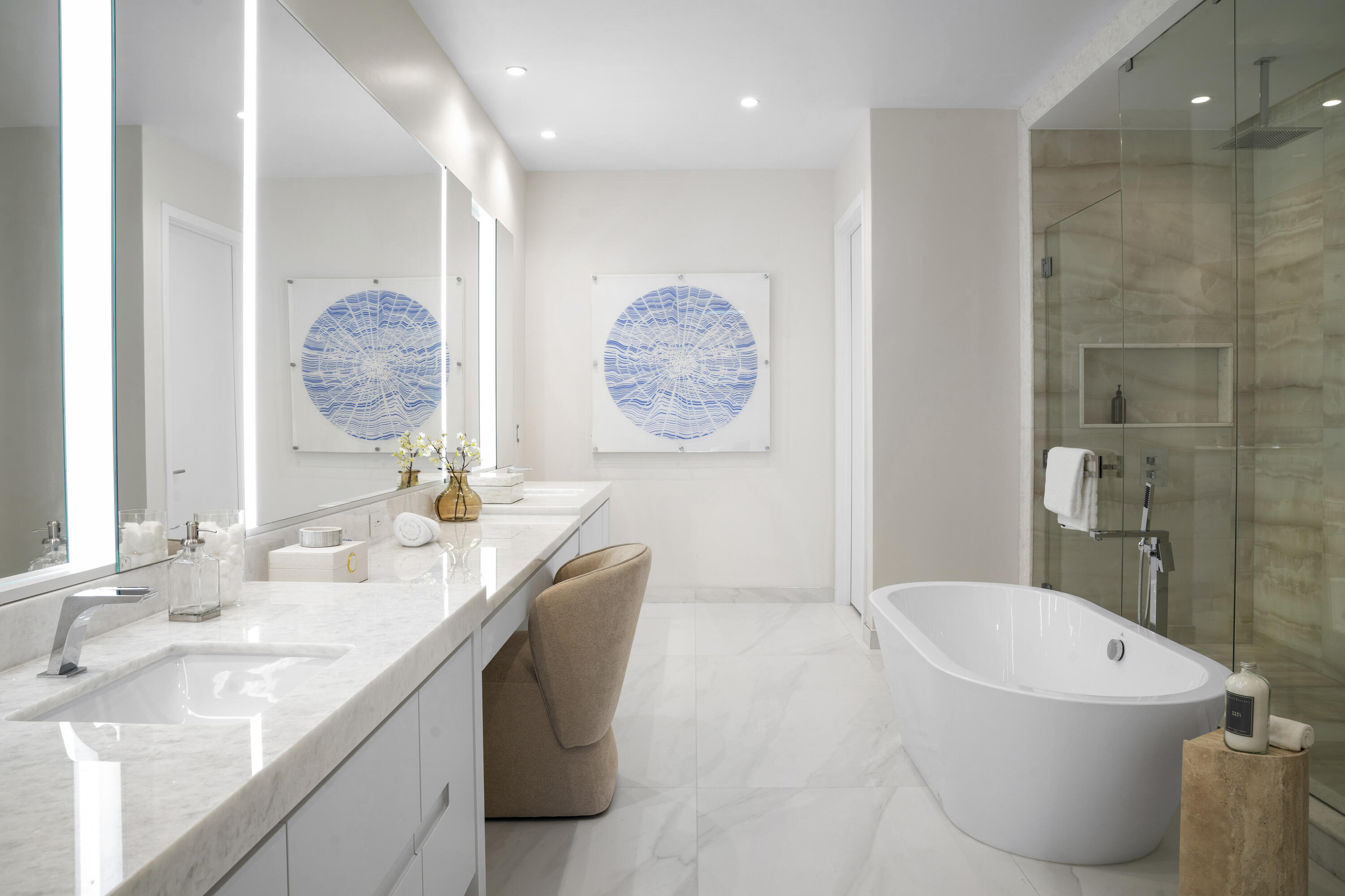 220 Southeast Mizner Boulevard, Unit PH921 Boca Raton, FL 33432 - Photo 8 of 21 a bathroom with a granite countertop sink a toilet and a mirror