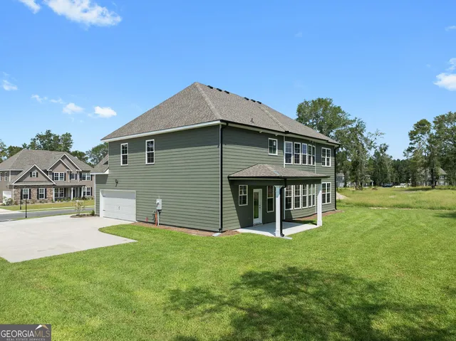 a house view with a garden space