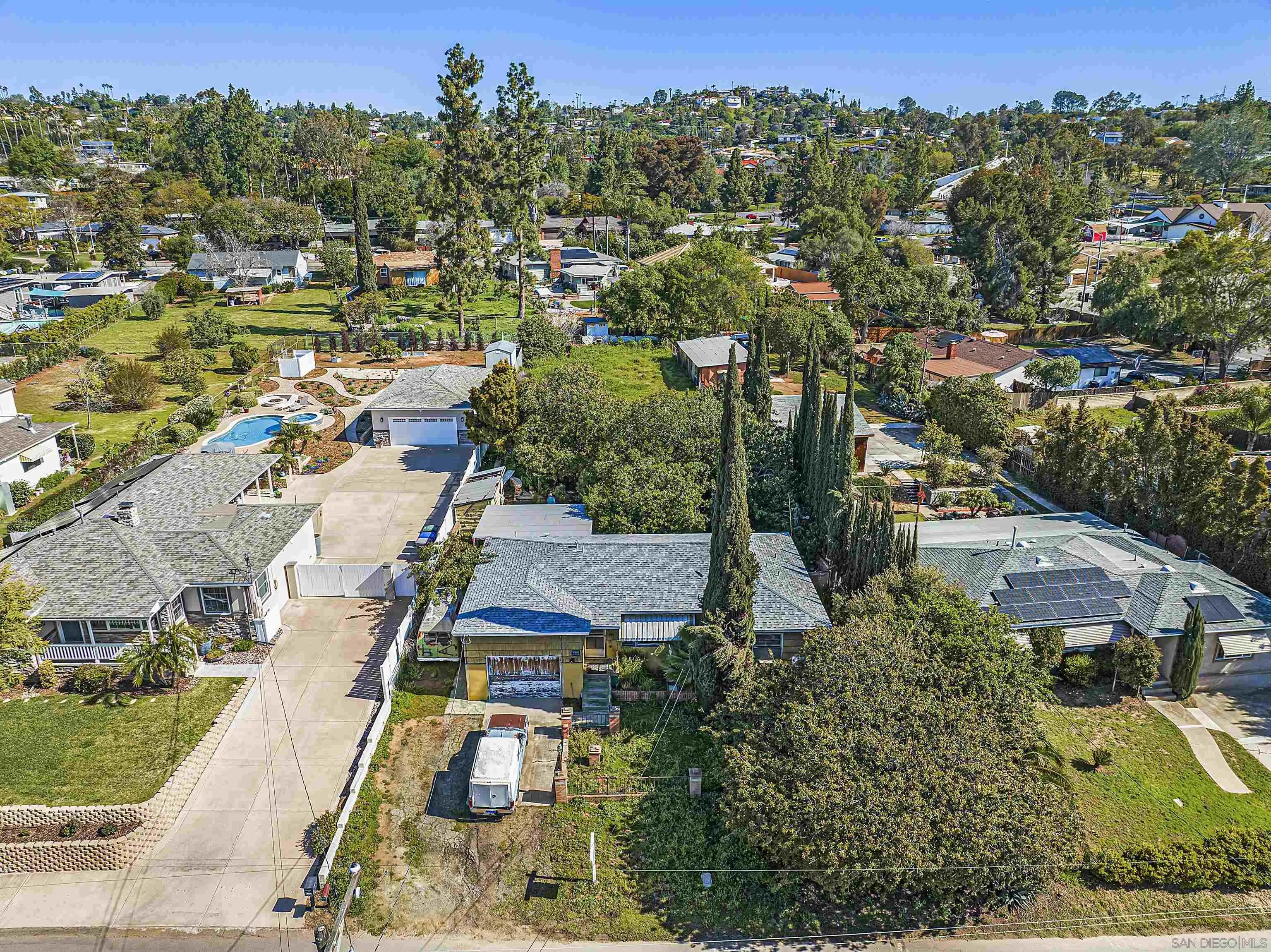 10744 Louisa Drive La Mesa, CA 91941 - Photo 1 of 19 an aerial view of residential houses with outdoor space and street view