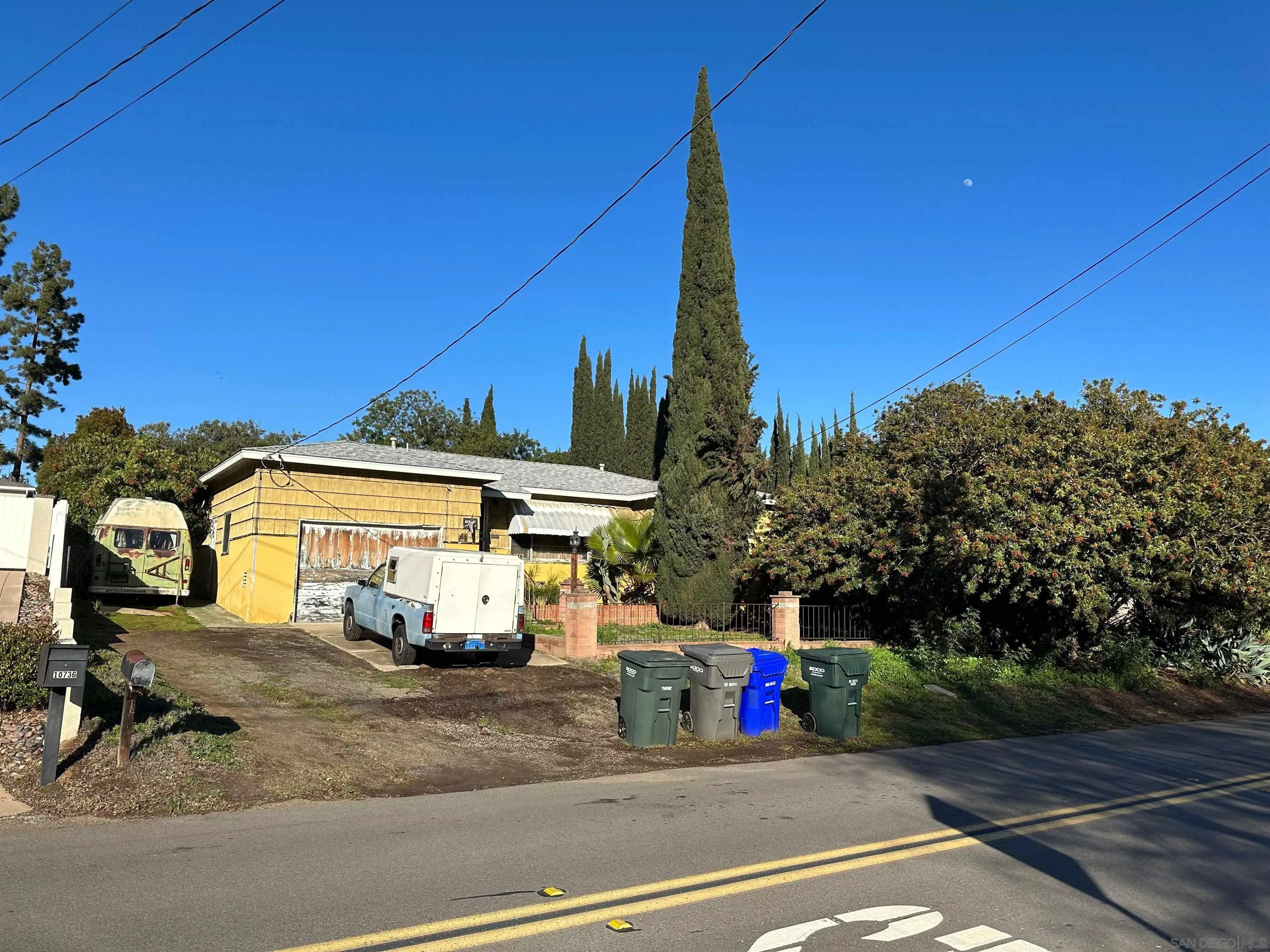 10744 Louisa Drive La Mesa, CA 91941 - Photo 4 of 19 a view of a car park in front of a building