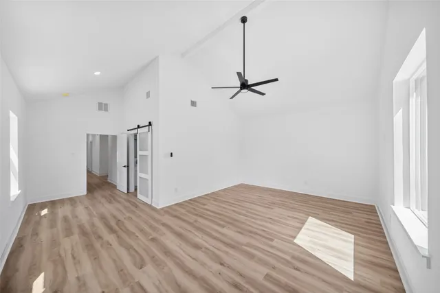 an empty room with windows