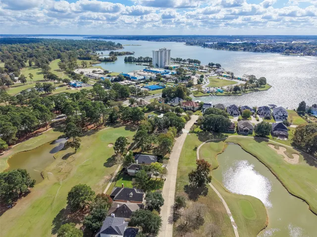 a view of a swimming pool and lake view