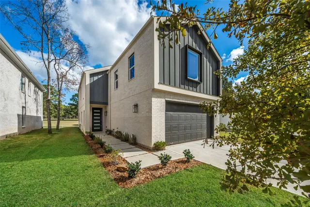 a backyard of a house with lots of green space