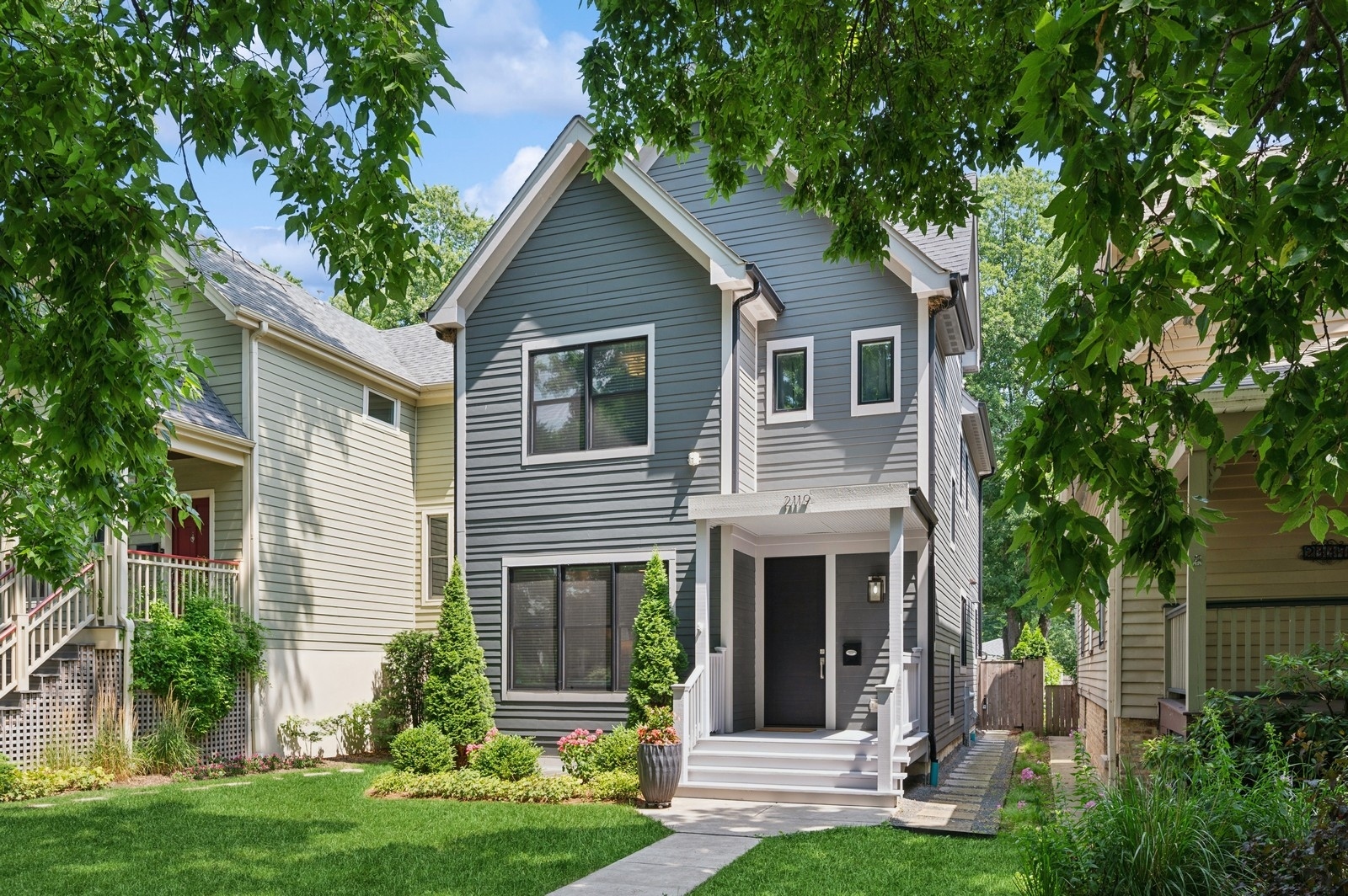 2119 Pioneer Road Evanston, IL 60201 - Photo 1 of 36 a front view of a house with a yard