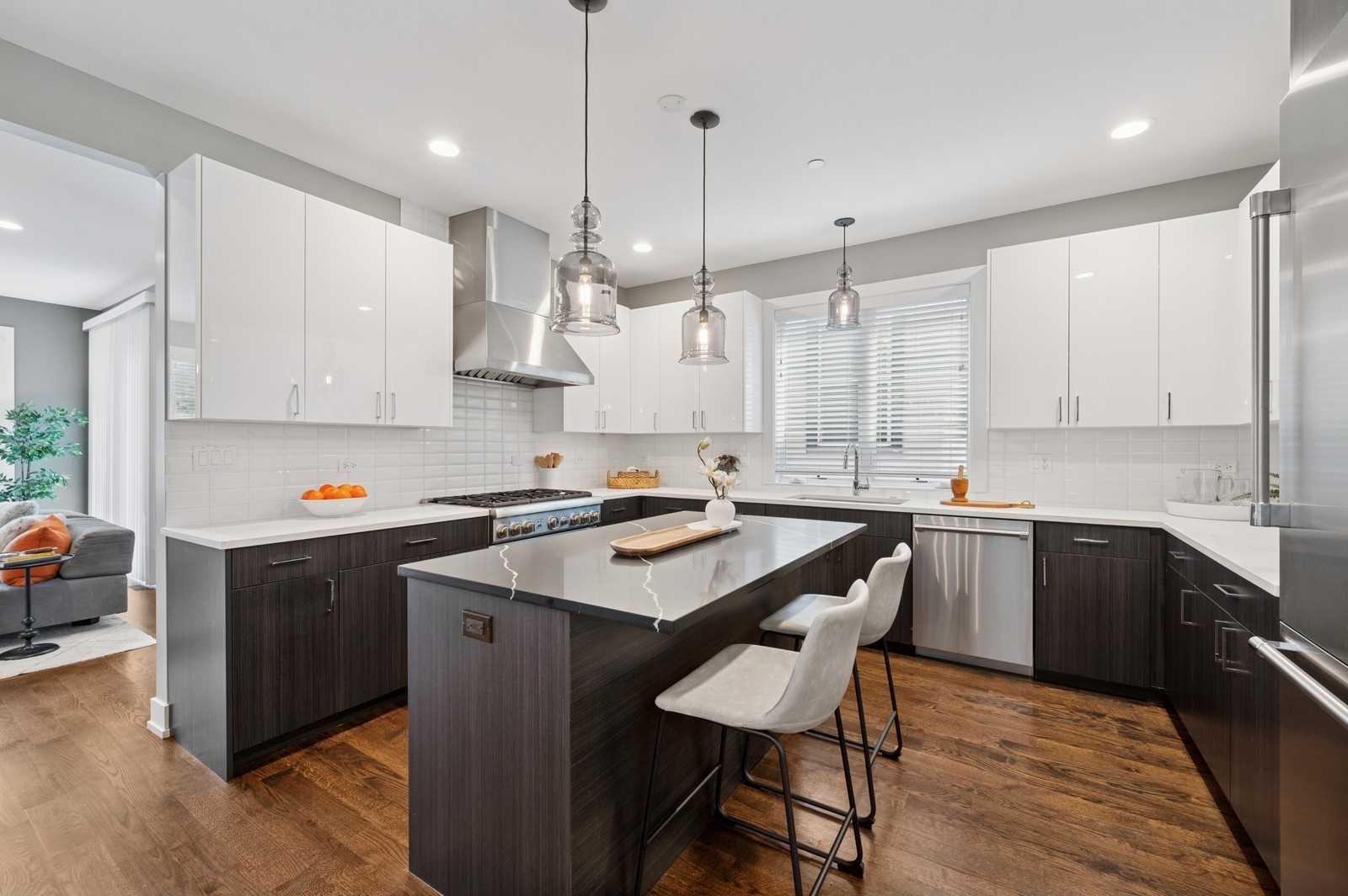 2119 Pioneer Road Evanston, IL 60201 - Photo 11 of 36 a kitchen with kitchen island a stove a sink a center island and cabinets