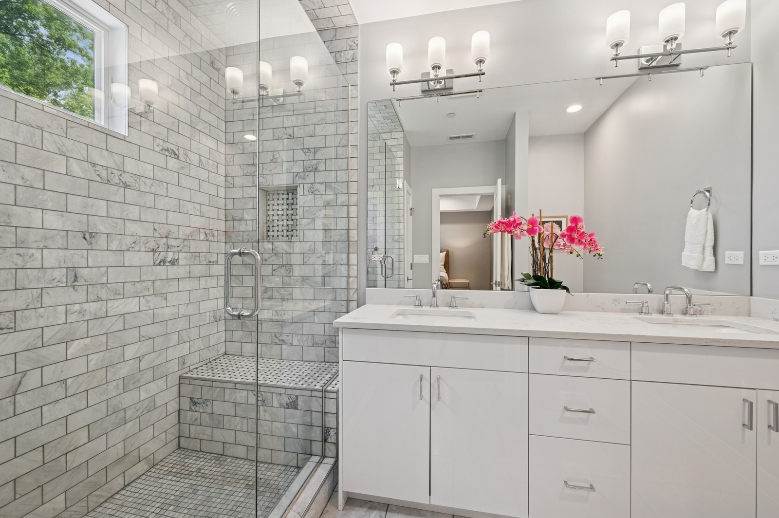 2119 Pioneer Road Evanston, IL 60201 - Photo 18 of 36 a bathroom with a sink shower and a mirror