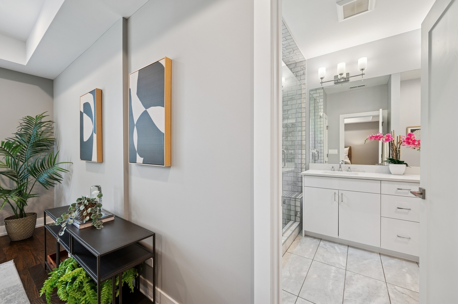 2119 Pioneer Road Evanston, IL 60201 - Photo 19 of 36 a bathroom with a sink vanity and mirror