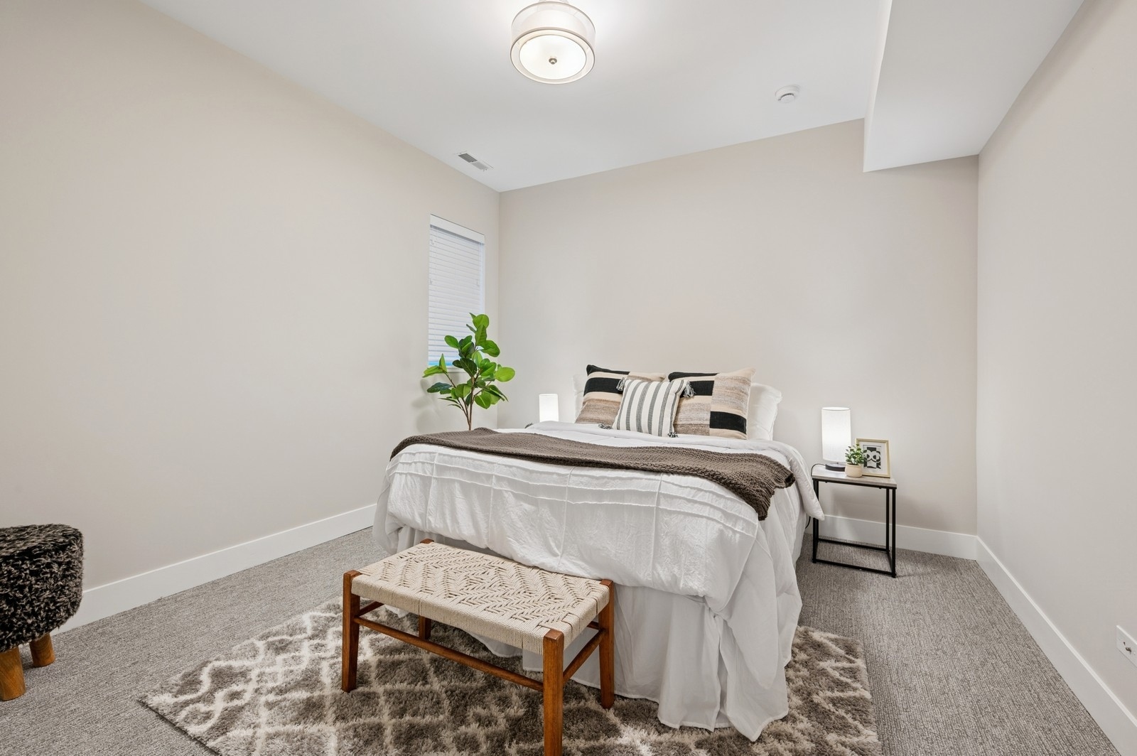 2119 Pioneer Road Evanston, IL 60201 - Photo 30 of 36 a bedroom with a bed and a chair