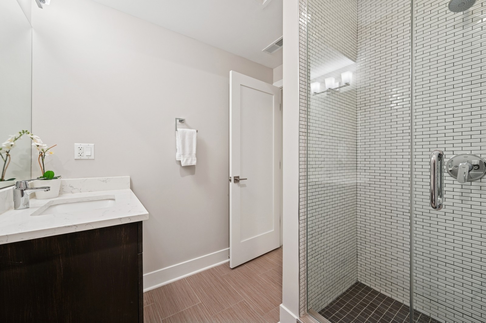 2119 Pioneer Road Evanston, IL 60201 - Photo 31 of 36 a bathroom with a sink and mirror