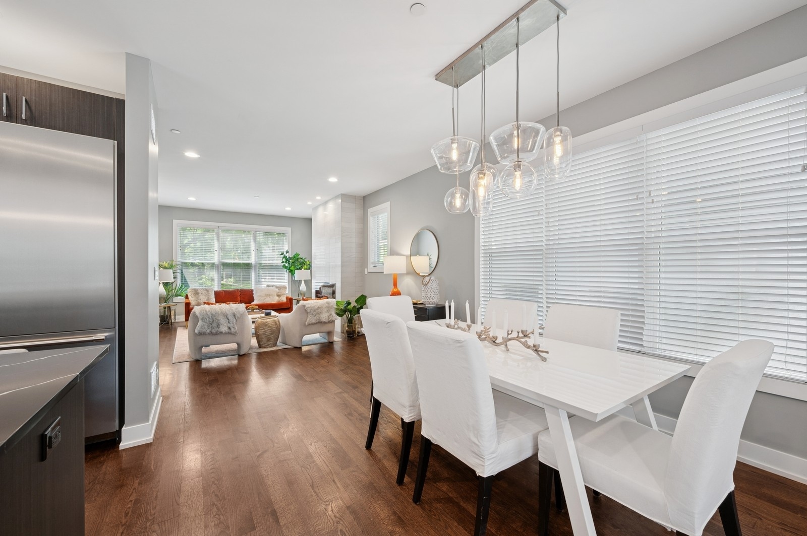 2119 Pioneer Road Evanston, IL 60201 - Photo 7 of 36 a view of a dining room with furniture wooden floor and chandelier