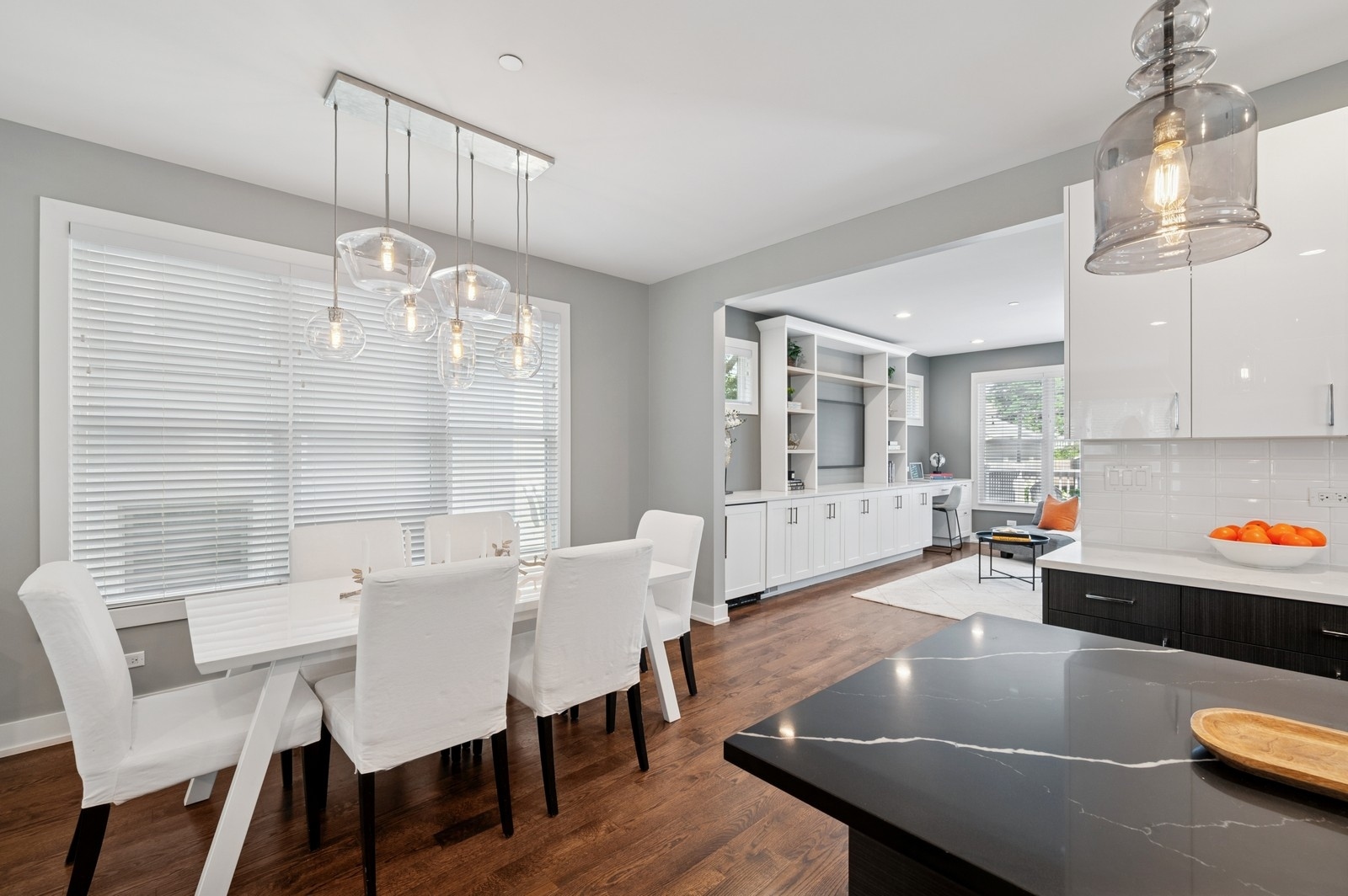 2119 Pioneer Road Evanston, IL 60201 - Photo 8 of 36 a view of a dining room with furniture and chandelier