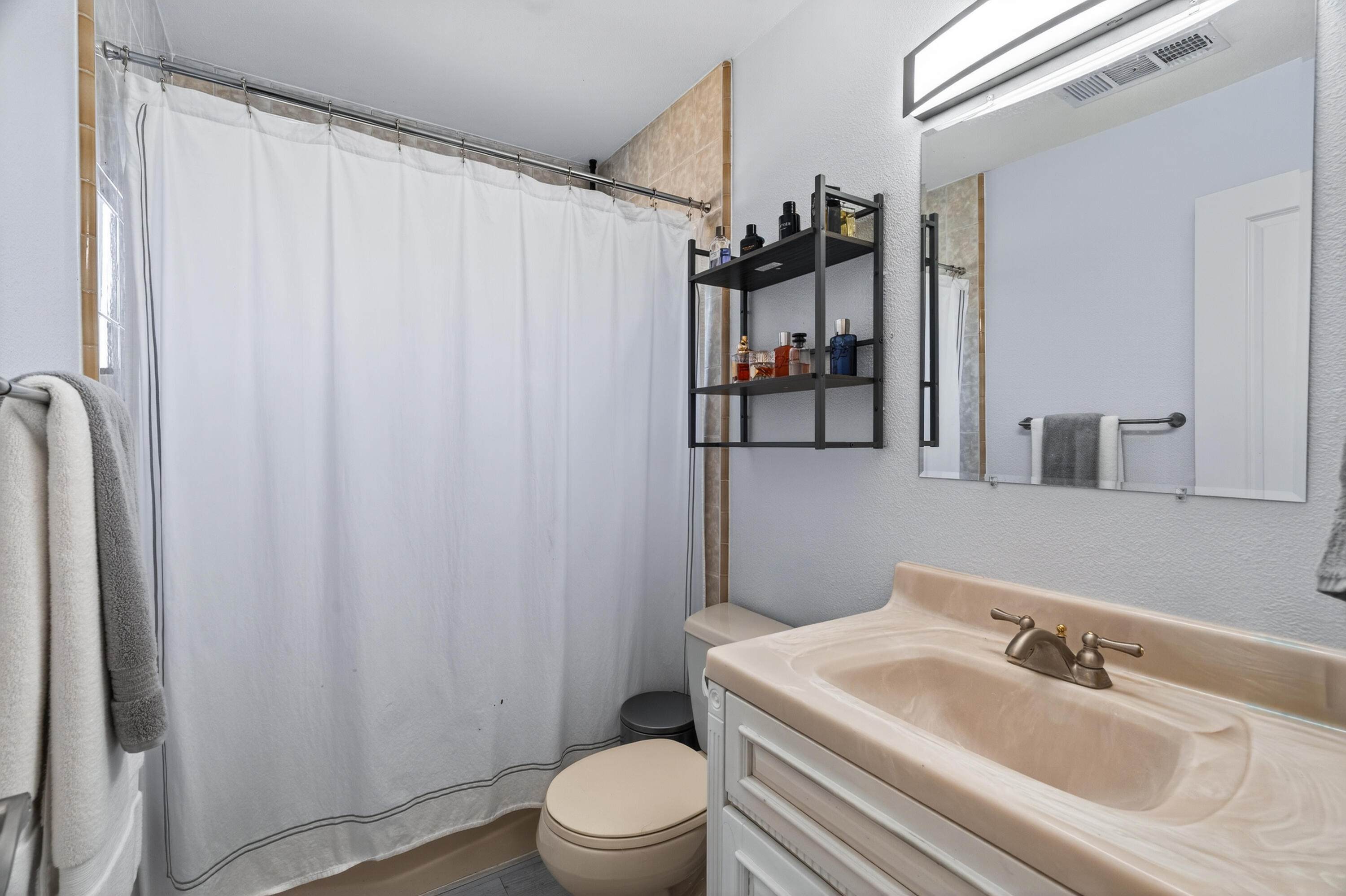 810 Cascade Avenue Red Bluff, CA 96080 - Photo 15 of 23 a bathroom with a sink toilet and shower