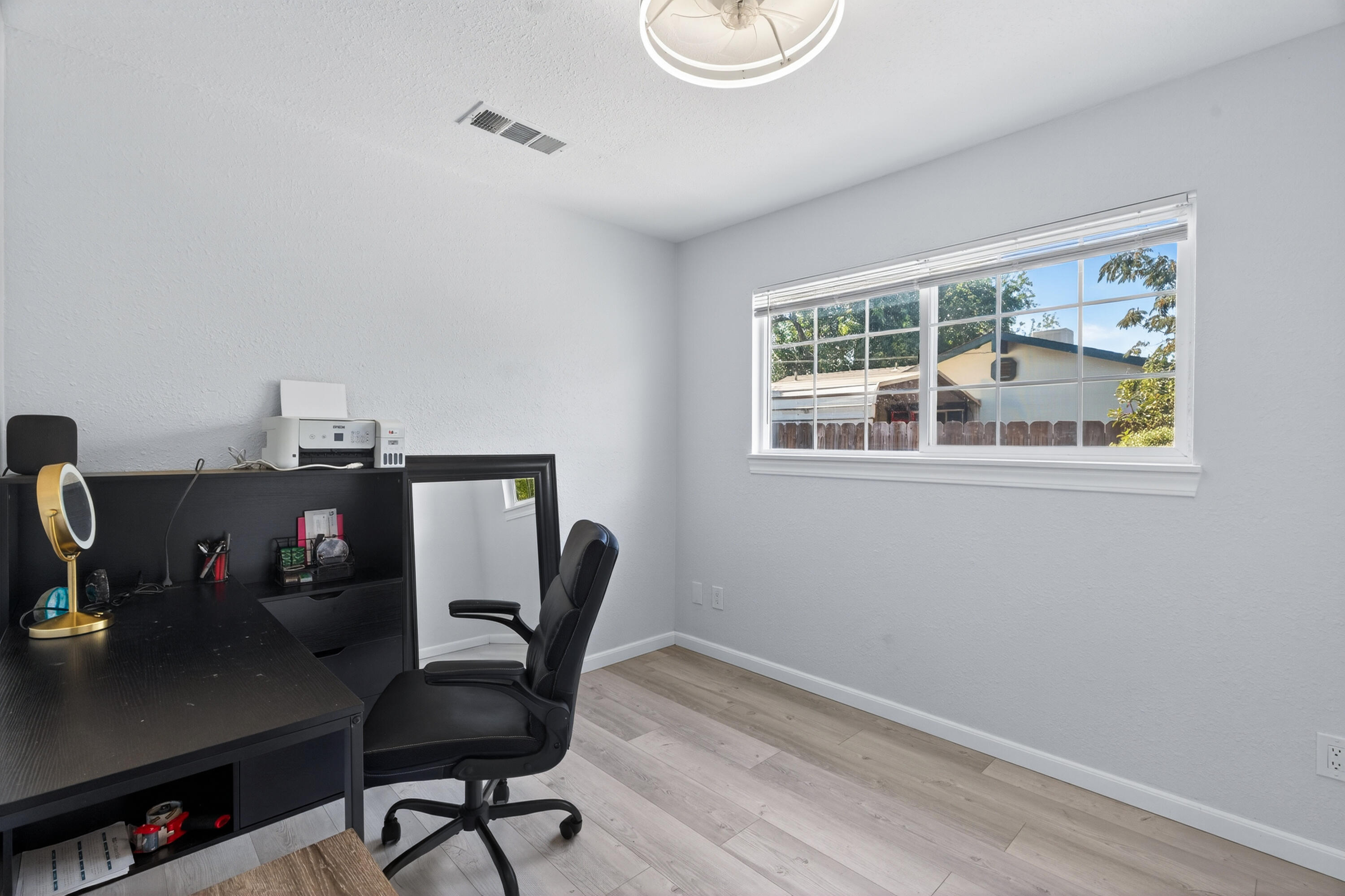 810 Cascade Avenue Red Bluff, CA 96080 - Photo 16 of 23 a view of a workspace with furniture and a window
