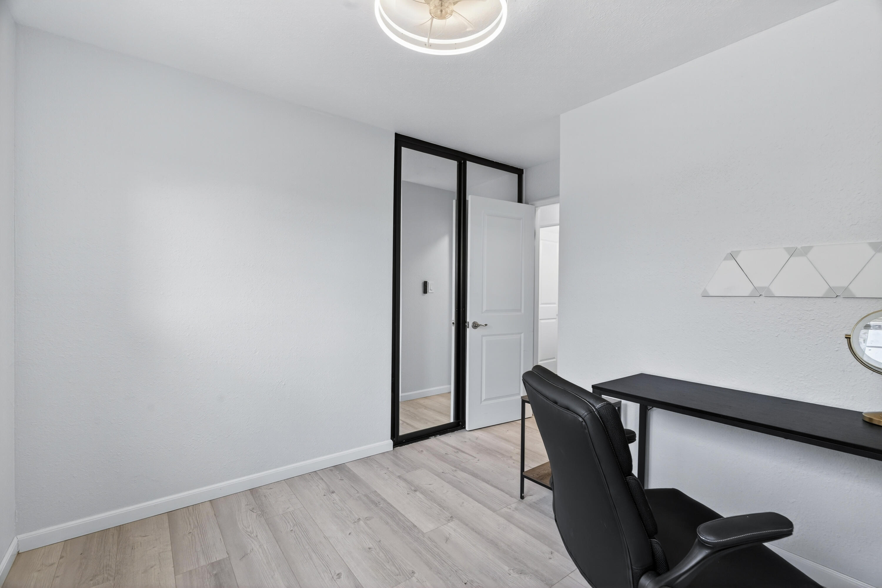 810 Cascade Avenue Red Bluff, CA 96080 - Photo 17 of 23 a view of workspace with furniture and wooden floor
